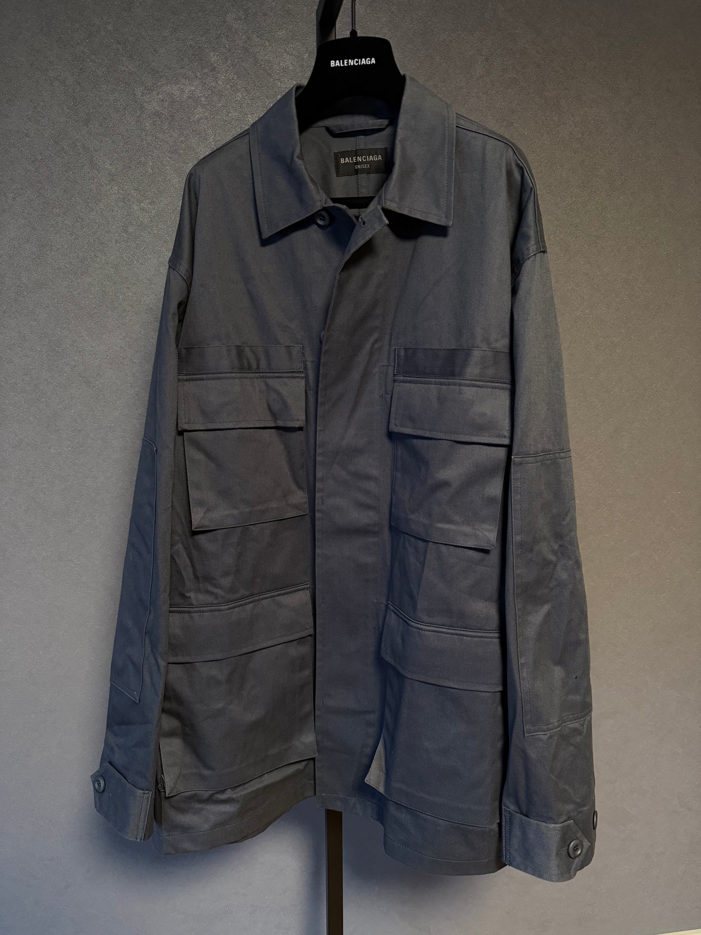 Detail shot of Balenciaga FW22 Cargo Jacket showing cargo pockets and hardware.