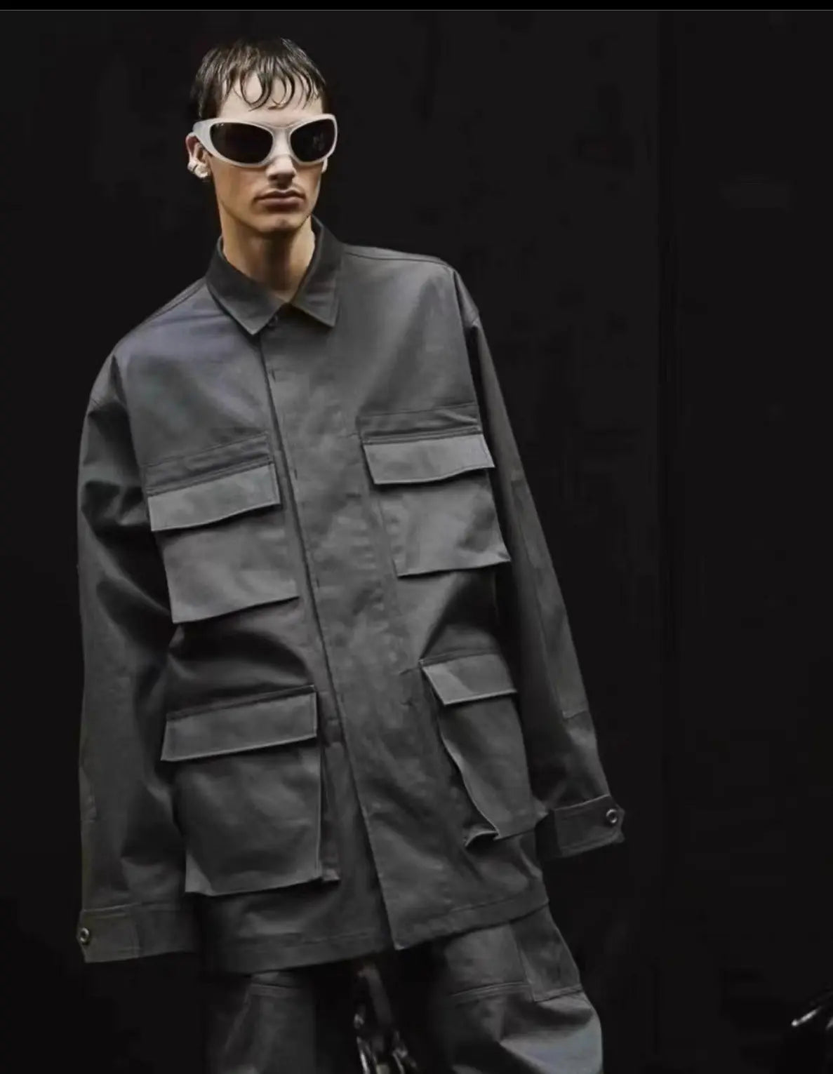 Detail shot of Balenciaga FW22 Cargo Jacket showing cargo pockets and hardware.