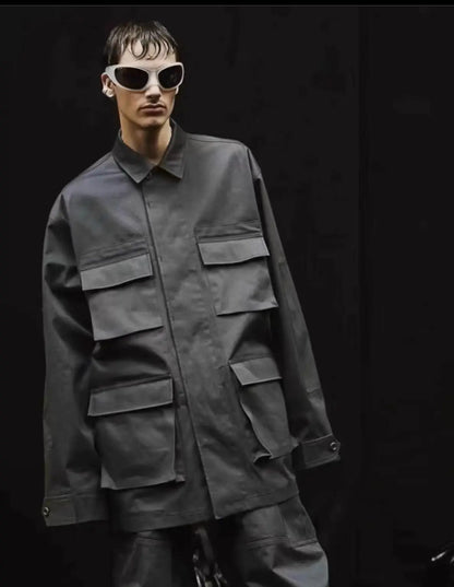 Detail shot of Balenciaga FW22 Cargo Jacket showing cargo pockets and hardware.